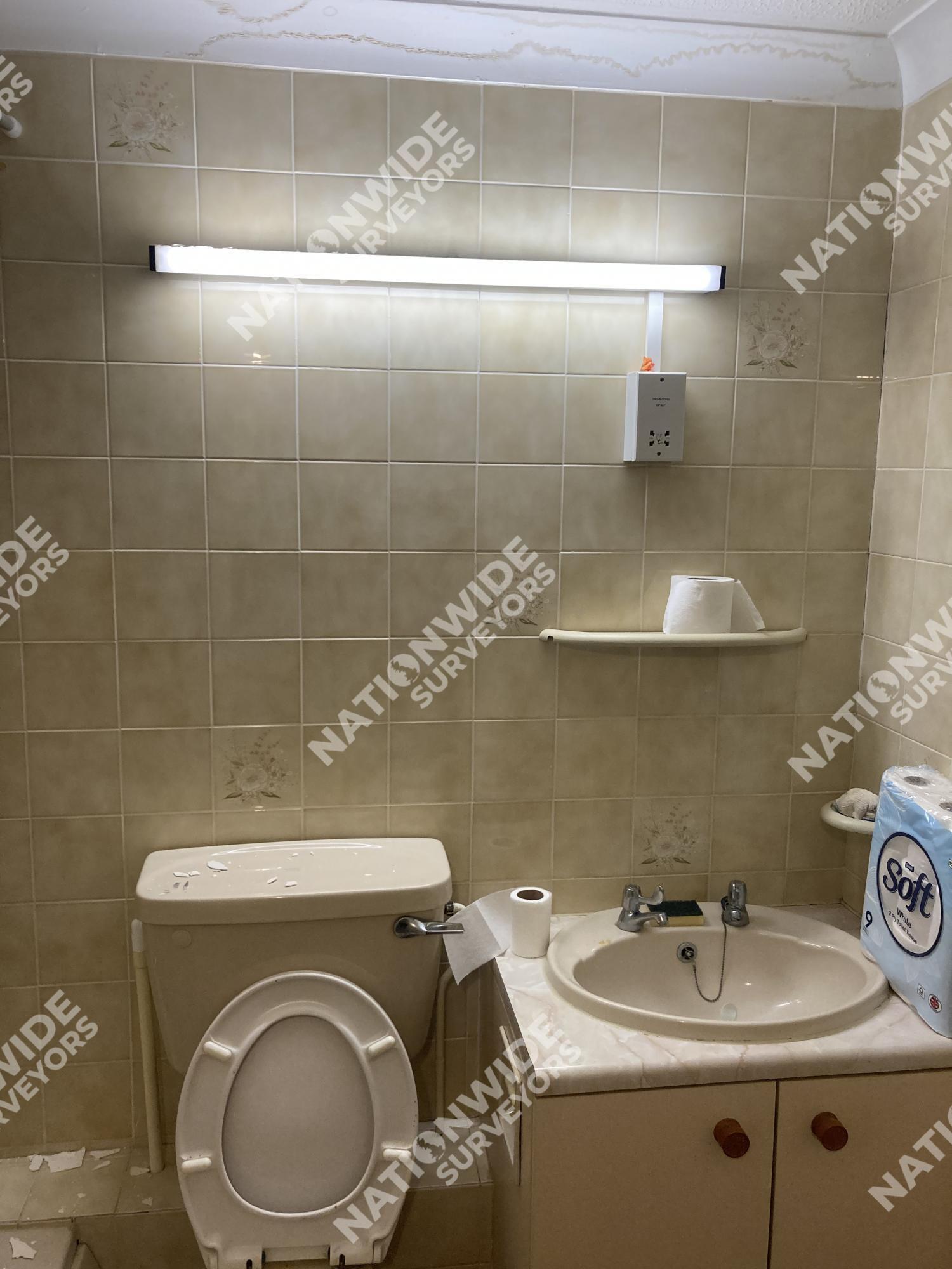 Before Bathorom light replaced Before Bathorom light replaced