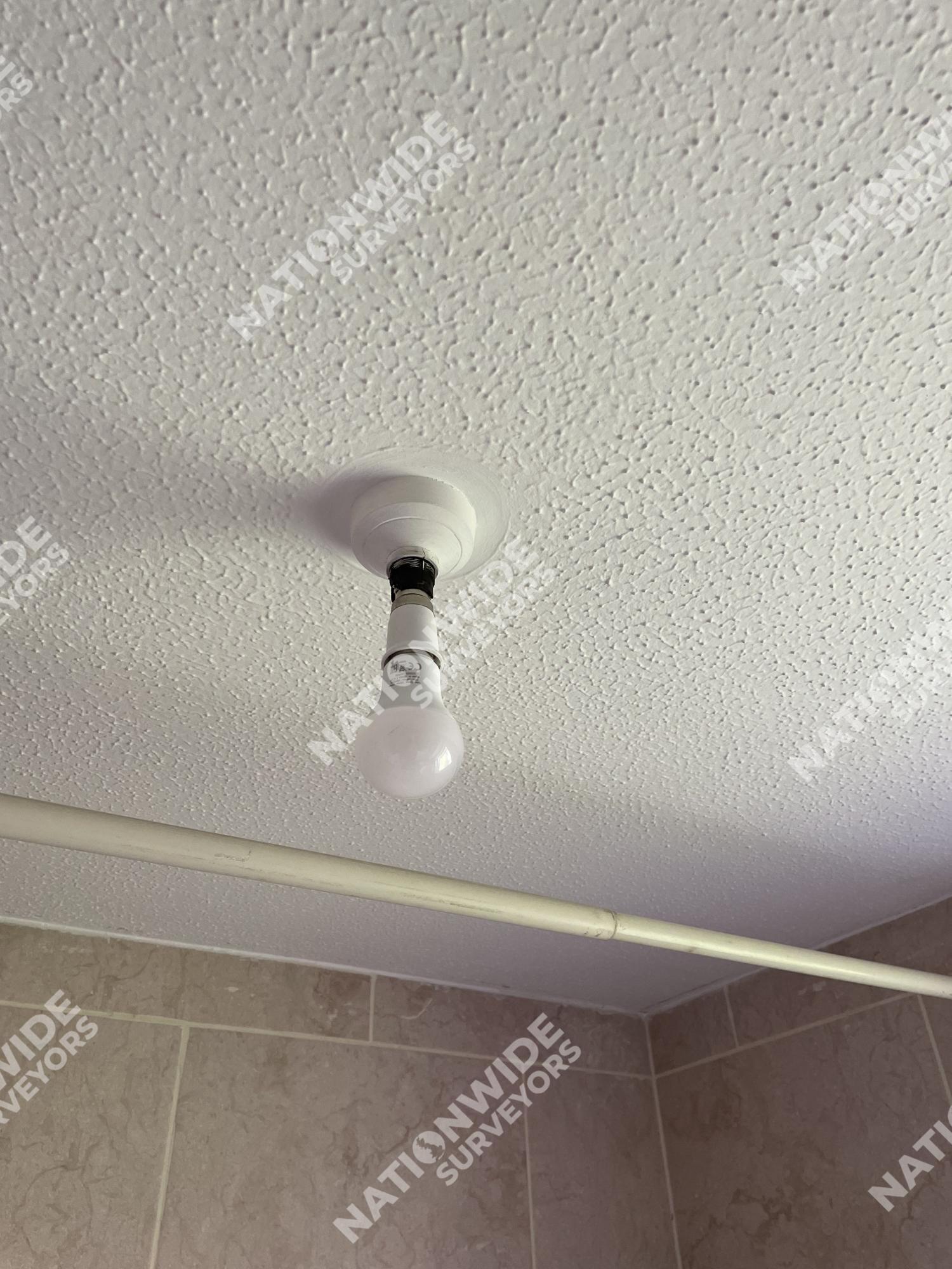 Before bathroom light replaced Before bathroom light replaced